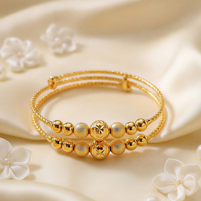 Luxe Double-Layer Golden Bangle – Star-Engraved & Textured Bead Design