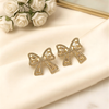 Shimmering Crystal Ribbon Bow Studs – Elegant Feminine Statement Earrings