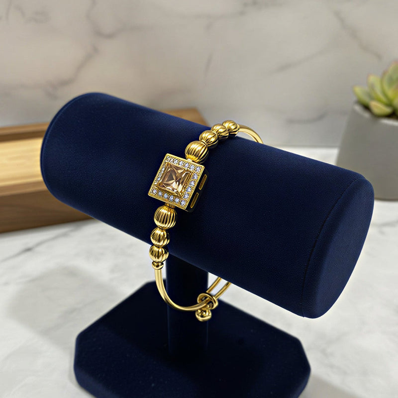 Luxe Golden Square Crystal Bangle – Ribbed Bead & Charm Design