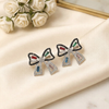 Shimmering Crystal Ribbon Bow Studs – Elegant Feminine Statement Earrings