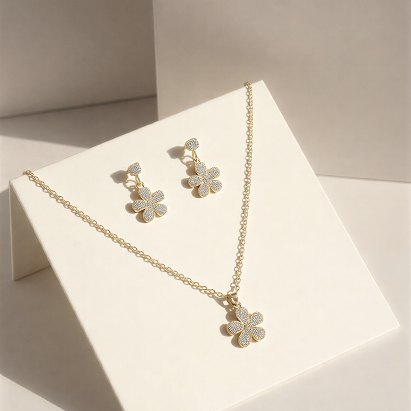 Shimmering Crystal-Pave Floral Suite – Elegant Petal Pendant & Drop Earring Set