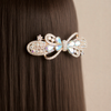 Exquisite Filigree Floral Hair Barrette – Shimmering Metallic Petal Clip .