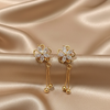Elegant Gold-Plated Floral Drop Earrings with Delicate Chain Tassels