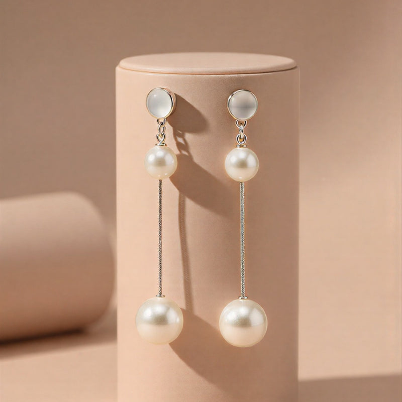 Elegant Dual-Pearl Drop Earrings – High-Shine Geometric Studs..