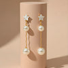 Elegant Dual-Pearl Drop Earrings – High-Shine Geometric Studs .