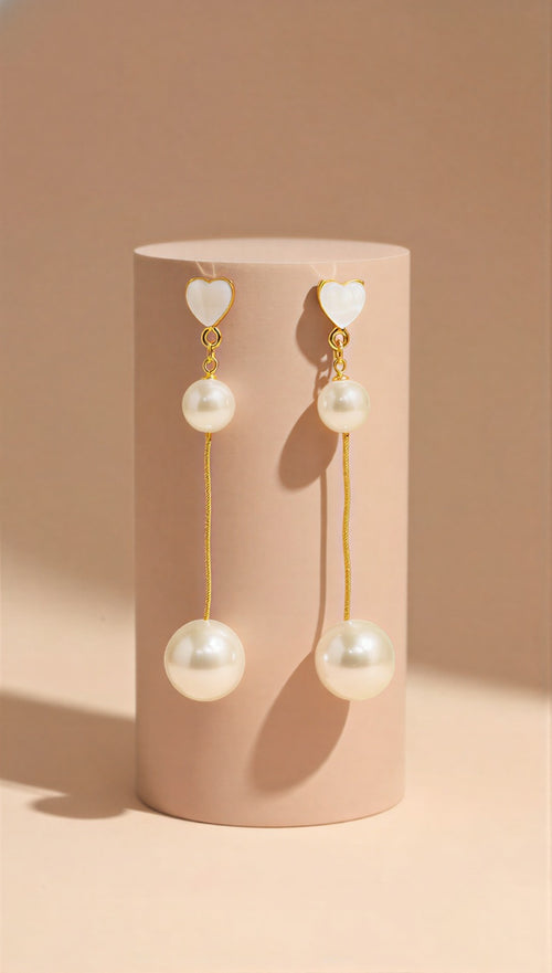 Elegant Dual-Pearl Drop Earrings – High-Shine Geometric Studs.