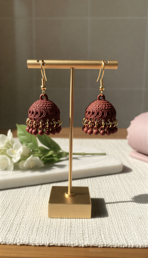 Explore vibrant Matte Jhumka earrings at One Jewellery. Available in Teal, Pink, Lavender, Green, and more. Lightweight design, perfect for weddings and festive wear.