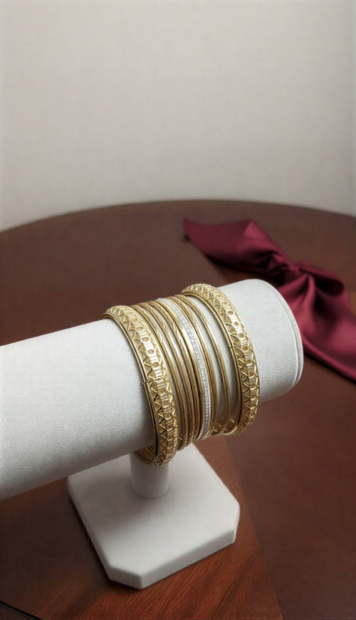 Traditional gold-toned textured bangles for party wear - One Jewellery.