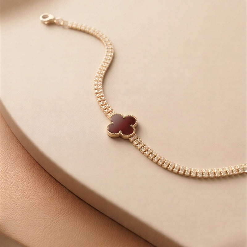 ''Signature Glow: High-Definition Baguette Stone Bracelet in Premium Gold Finish''