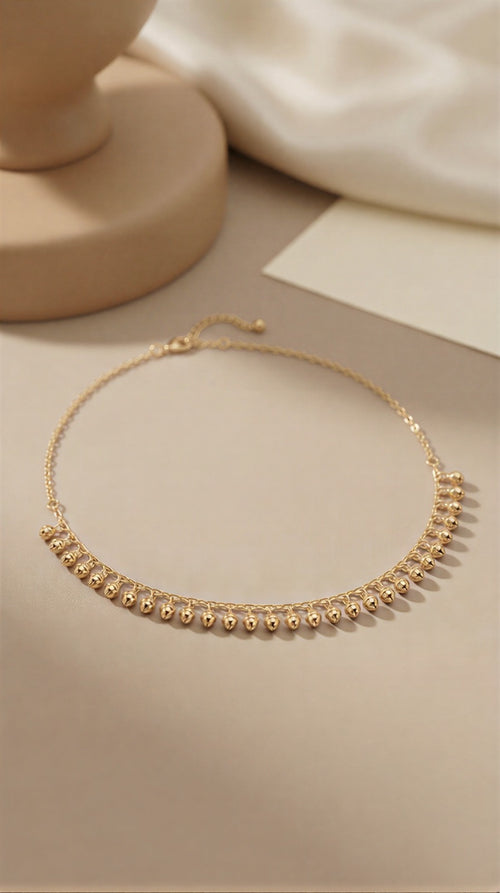 Shimmering Crystal Wing Necklace – Delicate Gold-Finish Chain with Tear-Drop Gemstone Accent