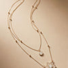 Midnight Onyx Layered Floral Necklace – Dual-Chain Gold Finish with Crystal-Encrusted Petals & Teardrop Drop