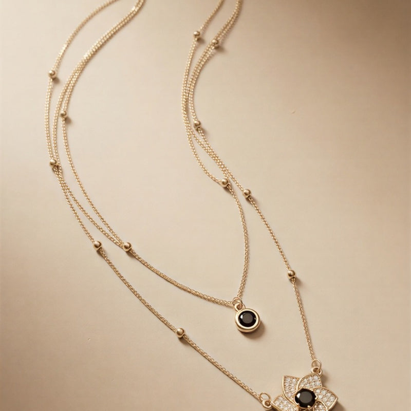 Midnight Onyx Layered Floral Necklace – Dual-Chain Gold Finish with Crystal-Encrusted Petals & Teardrop Drop