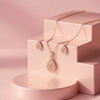 Luxe Gardenia Series: Intricate Floral Teardrop Pendant & Earring Set in Premium Rose Gold Finish