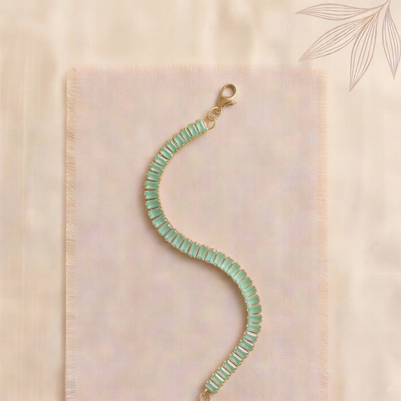 The Serene Sea-Foam Baguette: Elite Single-Strand Tennis Bracelet Featuring Sea-Green Emerald-Cut Crystals in a Radiant Gold-Tone Adjustable Frame