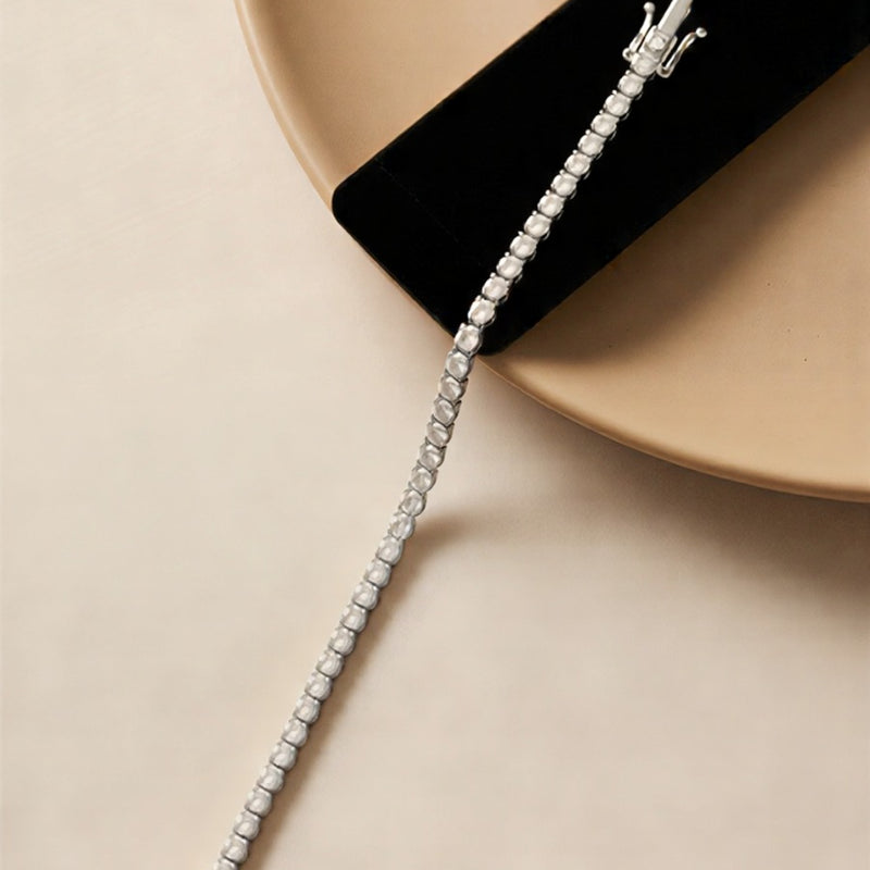The Prestige Dual-Tone Gallery: A Curated Selection of Luxury Baguette-Cut and Brilliant-Stardust Tennis Bracelets in Radiant Gold and Polished Silver Finishes