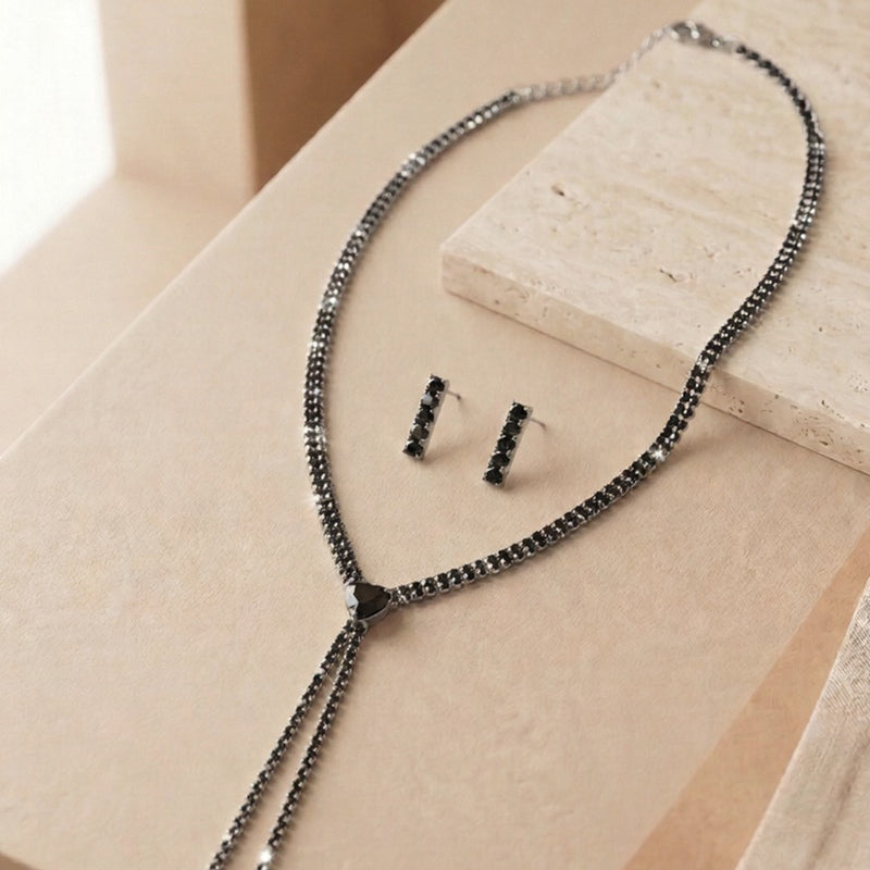 A Masterpiece Tassel Necklace Featuring Onyx-Black Crystals and Polished Metallic Detailing for a Bold, Sophisticated Look.