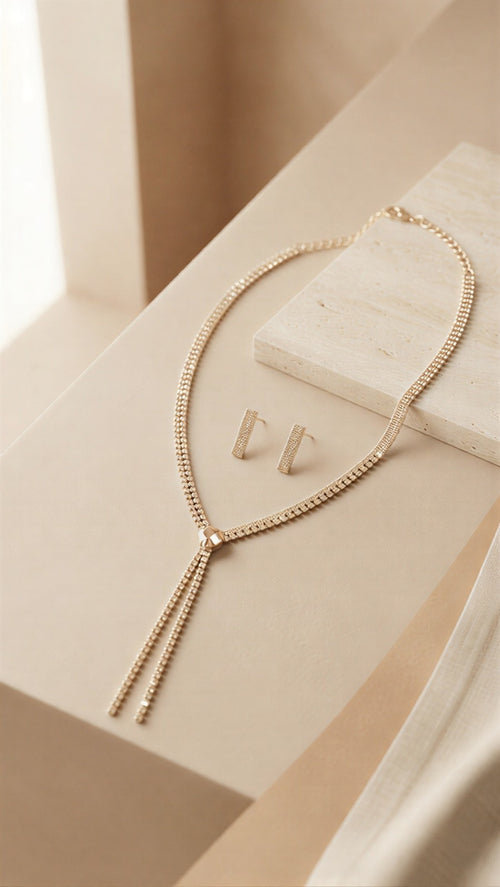The Golden Cascade Ensemble: A Sophisticated Double-Strand Drop Necklace with Matching Textured Bar Studs in a Radiant Gold-Tone Finish