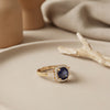 The Azure & Emerald Sovereign Anthology: An Imperial Cushion-Cut Gemstone Statement Ring Collection featuring Radiant Gold & Sterling Silver Finishes
