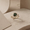 The Forest Ether Masterpiece: An Avant-Garde Pear-Shaped Radiant Green Solitaire Enveloped in Architectural Crystalline Contours with Dual-Tone Metallic Versatility