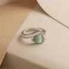 : A High-Definition Statement Ring Showcasing a Translucent Mint Teardrop and Precision-Engineered Accents in Gold & Silver Variations.