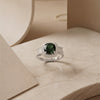 The Forest Ether Masterpiece: An Avant-Garde Pear-Shaped Radiant Green Solitaire Enveloped in Architectural Crystalline Contours with Dual-Tone Metallic Versatility