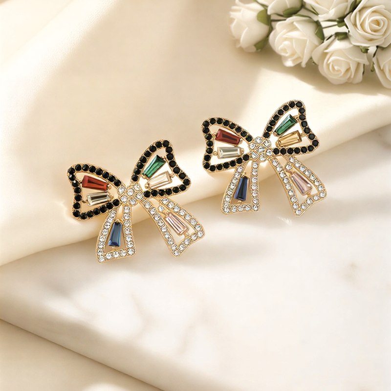 Shimmering Crystal Ribbon Bow Studs – Elegant Feminine Statement Earrings