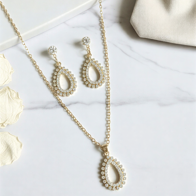 Radiant Crystal Teardrop Suite – Exquisite Open-Frame Pendant & Drop Earring Set